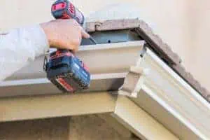 LA Roofing Installing Gutter Guard